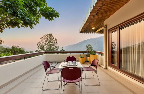 Dharampur Villa | StayVista at Panorama Estate with cosy seating