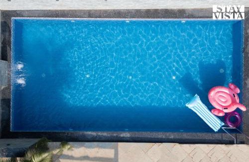 Morjim Villa | StayVista at Woodhouse Story with Pool, WiFi, AC