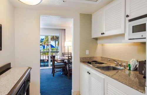 St. Pete Beach Hotel | Steps Away from the Beach! 2 Rooms with Tropical Views, Outdoor Pools!
