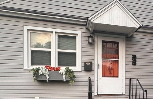 Sheridan Casa | "Steps from downtown and the park, this cozy mid-century hideaway offers comfort, charm, and a private outdoor escape."