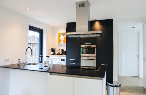 Baarland Casa | Stijlvol ingerichte (4 pers.) bungalow in Baarland