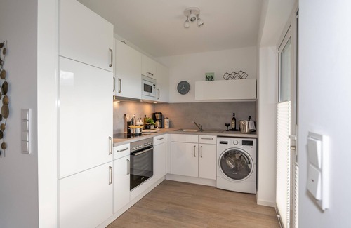 Busum Apartamento | Stillvoll Eingerichtete Ferienwohnung mit Sauna, Kamin, Terrasse und Waschtrockn