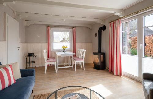 Suederhafen Apartamento | Stilvolles Kapteins Cottage mit Kamin - Inge
