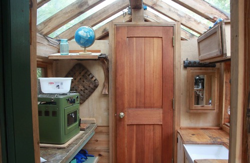 Canterbury Cabina | Stone Haven "Tent Cabin" with a cast iron fire pit in Canterbury, NH.