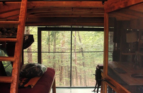 Canterbury Cabina | Stone Haven "Tent Cabin" with a cast iron fire pit in Canterbury, NH.