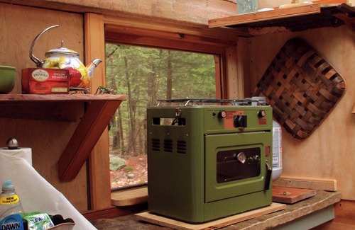 Canterbury Cabina | Stone Haven "Tent Cabin" with a cast iron fire pit in Canterbury, NH.