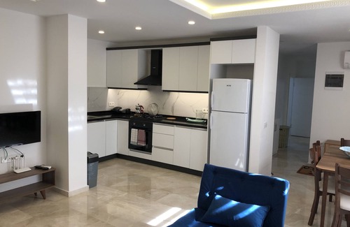 Kalkan Apartamento | Stone House Aparts Kalkan with large terrace on the ground floor