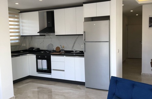 Kalkan Apartamento | Stone House Aparts Kalkan with large terrace on the ground floor