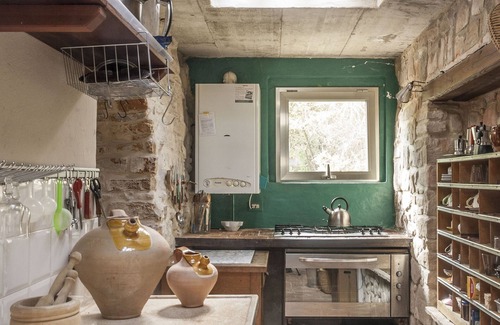Rotella Casa | casa de piedra con jardín y huerto orgánico entre mar y montaña
