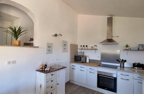 Arbellara Casa | Stone house located between sea and mountains
