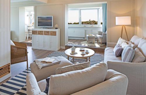 List Apartamento | Strandauster