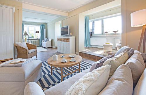 List Apartamento | Strandauster