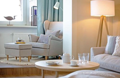 List Apartamento | Strandauster