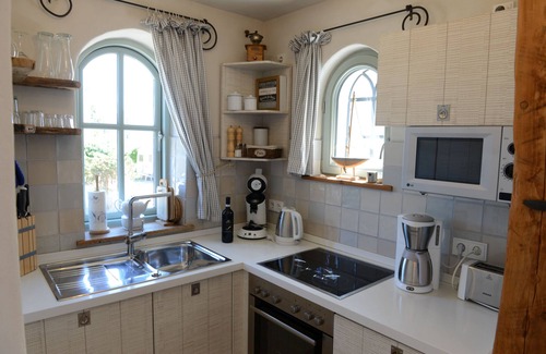 Fehmarnsund Condominio | Strandhaus-fehmarn, Captains-deck, Strandlage und Meerblick, Terrasse und Garten