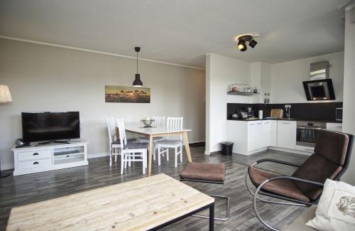 Lobbe Apartamento | strandnah mit Balkon, gratis Nutzung vom AHOI Erlebnisbad und Sauna in Sellin - Strandhaus Mönchgut FeWo11