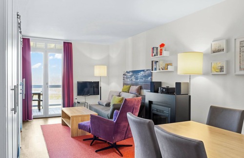 Wremen Apartamento | Strandnahe, Hundefreundliche Ferienwohnung mit Sauna und Balkon mit Strandkorb