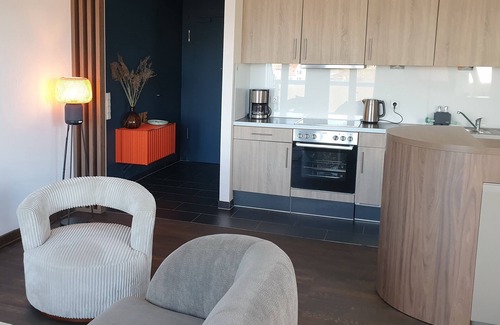Wremen Apartamento | Strandnahe, Tolle 92 qm Dachgeschosswohnung mit Sauna, 2 Balkonen und Meerblick
