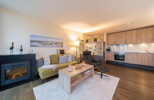 Wremen Apartamento | Strandnahe, Tolle Dachgeschosswohnung, Sauna, Zwei Balkone mit Land- & Meerblick