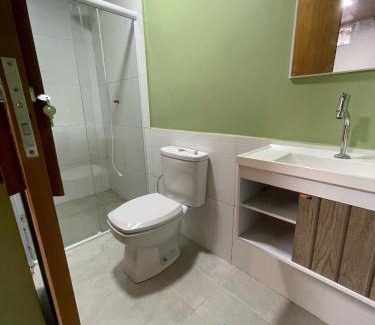 Macae Casa | STUDIO aconchego, com Ar, Wifi, Smartv e Cozinha