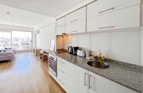 Microcentro Apartamento | Studio Apartment on 13th Floor with balcony terrace