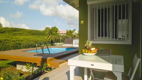 Sainte-Anne Apartamento | Studio avec piscine, à 3 minutes à pied des plages