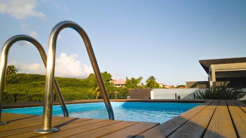 Sainte-Anne Apartamento | Studio avec piscine, à 3 minutes à pied des plages