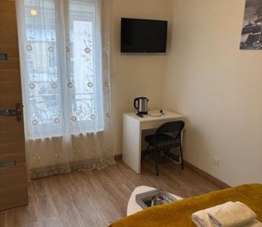 Enghien-les-Bains Apartamento | studio avec terrasse en face la gare d’Enghien a 15 minute de paris gare du nord et a 10 mn de stade de France