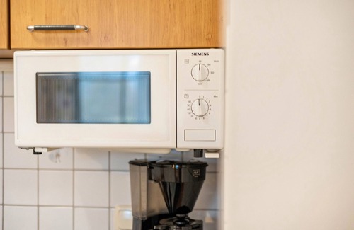 Oberaudorf Apartamento | Estudio 'Brünnstein-Zimmer 40' con vistas a la montaña, jardín compartido y Wi-Fi