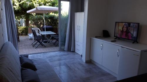 Port Rive Gauche Apartamento | Studio cabine avec jardinet à 30 m de la plage, au calme.