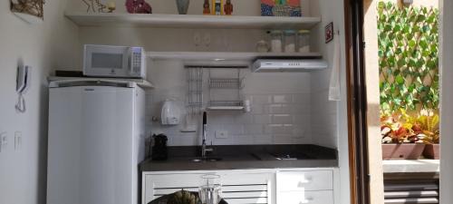 Juquehy Apartamento | Studio e Suite no Centro de Juquehy a 200mts da praia - Varanda e Serviço de Praia - E MAIS Ofurô - Cozinha e Estacionamento nas unidades "STUDIO"