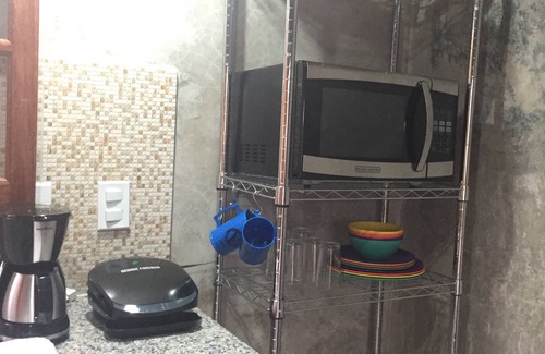 Praia Rasa Apartamento | casa estudio, suites