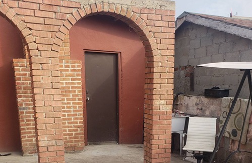 El Ciprés Apartamento | Studio, private restroom, safe carport parking, 20 min drive to the beach.