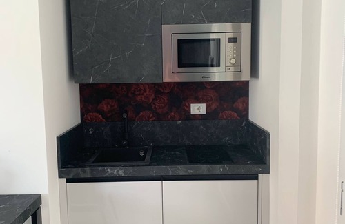 Villa San Pietro Apartamento | Estudio "Residence Meridian Unità 3" Cerca de la playa con vistas a la montaña, piscina y Wi-Fi