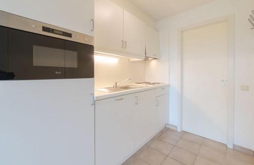 De Haan Apartamento | Studio Siena with parking and shared pool by Interhome