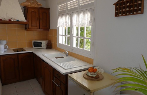 Capesterre-Belle-Eau Apartamento | Estudio sureste, gran terraza frente al mar en jardín tropical.