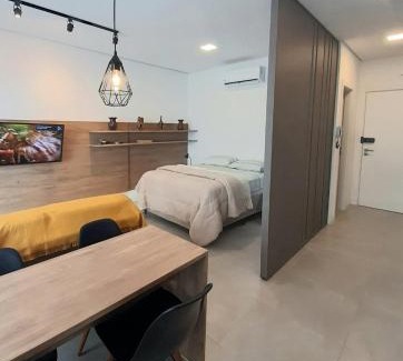 Centro Apartamento | Studio Xavante 308A - novo, confortável, com garagem coberta e portaria 24h