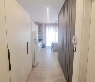 Centro Apartamento | Studio Xavante 308A - novo, confortável, com garagem coberta e portaria 24h