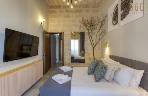 Paola Apartamento | Stunning 3BR Townhouse with Private Rooftop Access by 360 Estates