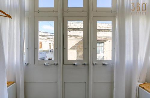 Paola Apartamento | Stunning 3BR Townhouse with Private Rooftop Access by 360 Estates