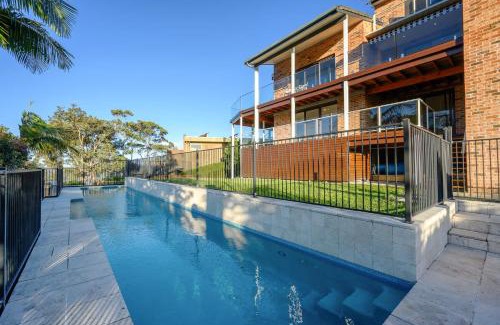 Tascott Casa | Stunning 4BR Home with Pool & Water Views