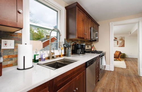 South Side Flats Apartamento | Stunning City View! Sleeps 10. Kids Game Room and Large Rooftop.