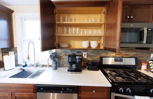 South Side Flats Apartamento | Stunning City View! Sleeps 10. Kids Game Room and Large Rooftop.