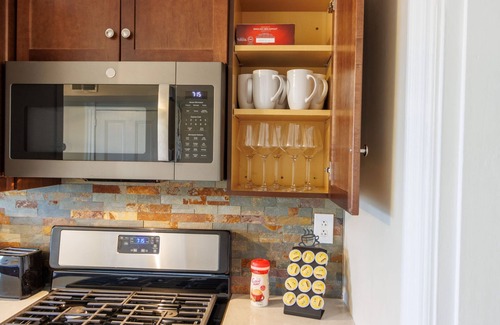 South Side Flats Apartamento | Stunning City View! Sleeps 10. Kids Game Room and Large Rooftop.
