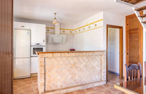Sanlúcar la Mayor Casa | Preciosa casa de vacaciones privada con A/C, WIFI, piscina privada, TV, patio, mascotas permitida