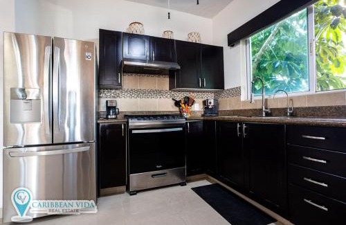 Puerto Aventuras Apartamento | Stunning Large Remodeled Penthouse-Big Canal Views