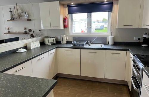 Great Yarmouth Cabina | Stunning lodge boasting large decking area at California Cliffs ref 50008L