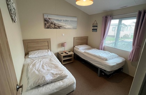 Great Yarmouth Cabina | Stunning lodge boasting large decking area at California Cliffs ref 50008L