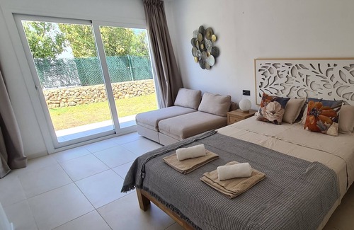 Sant Jaume Mediterrani Casa | Stunning modern villa with stunning Son Bou beach views, heated pool