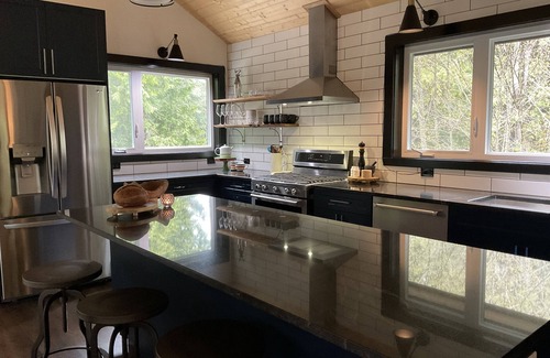 Tofino Casa | Stunning oceanfront oasis with majestic mountain and lush forest views.