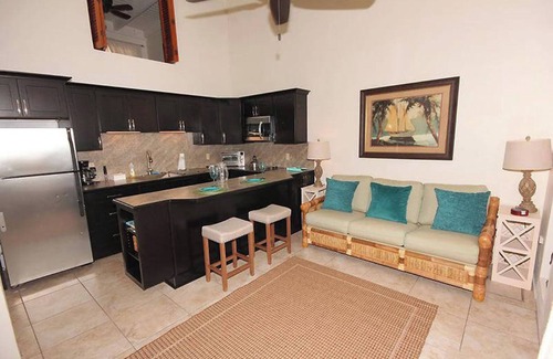 Estate Enighed Condominio | Stunning Sunsets, Modern A/C, & Updated Living – Your Dream Condo Awaits!